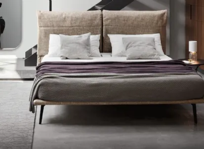 Letto in tessuto con testiera Landa di Calligaris